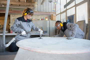 polishing the marble table