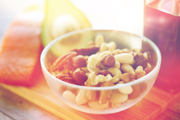 close up of nut mix in glass bowl on table