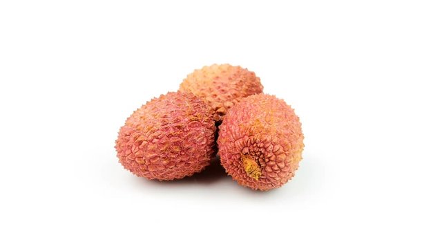 fresh lychees on old white background