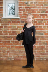 young girl dancer stretching
