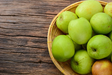 fresh green jujube on wooden table