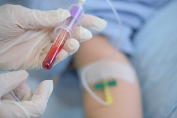 extracting blood from patient
