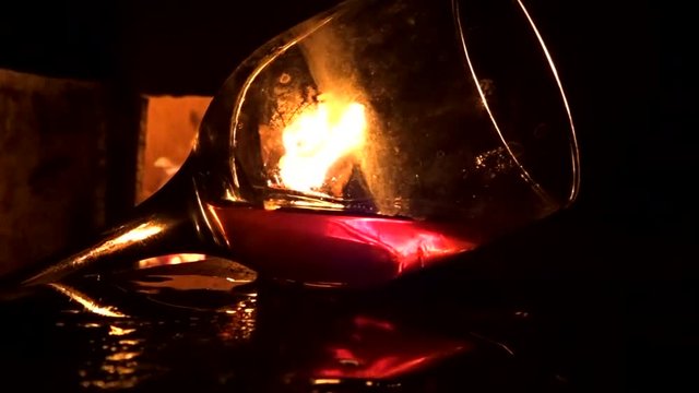 glass of cognac and flame