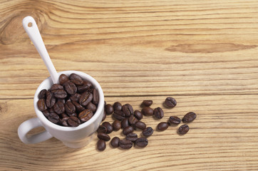 Coffee beans in cup