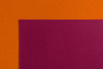 Fototapeta premium Eva foam ethylene vinyl acetate smooth red surface on orange sponge plush background
