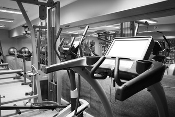 Modern equipment in gym. Black and white photo