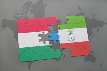 puzzle with the national flag of hungary and equatorial guinea on a world map