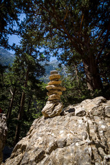 Samaria Gorge. Tourist tradition - a way of stones in the form of slides, in series or in the form of a pyramid. Island of Crete, Greece.