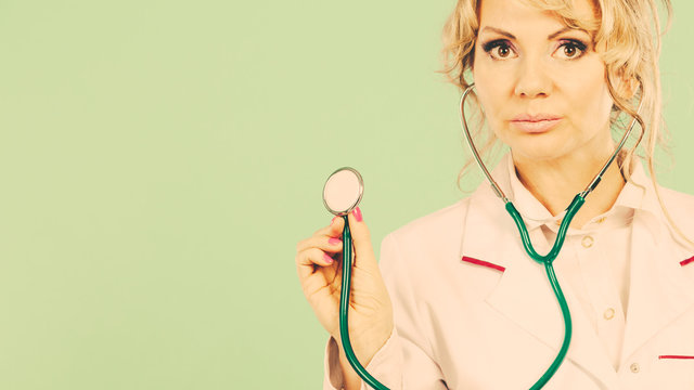 Woman doctor with stethoscope.