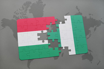 puzzle with the national flag of hungary and nigeria on a world map