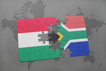 puzzle with the national flag of hungary and south africa on a world map