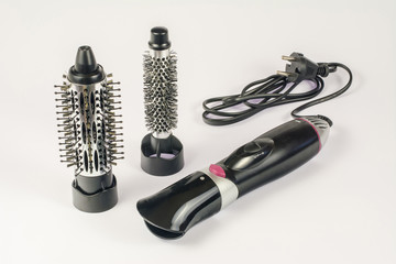 Hair dryer with different attachments