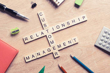Conceptual business keywords on table with elements of game making