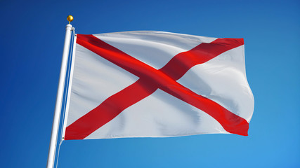 Alabama (U.S. state) flag waving against clear blue sky, close up, isolated with clipping path mask alpha channel transparency, perfect for film, news, composition