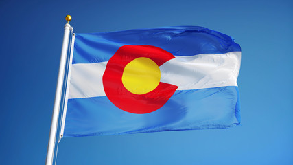 Colorado (U.S. state) flag waving against clear blue sky, close up, isolated with clipping path...