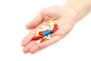Drugs in hand on a white background