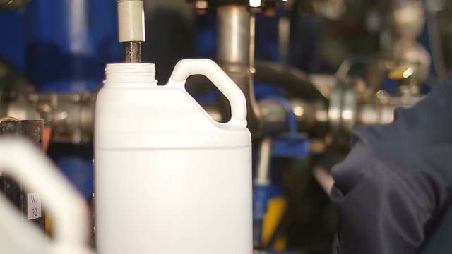 A canister with a dangerous liquid at the plant