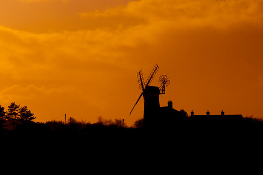 Windmill at Weybourne Norfolk at sunset