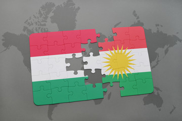 puzzle with the national flag of hungary and kurdistan on a world map