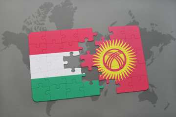puzzle with the national flag of hungary and kyrgyzstan on a world map