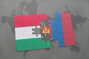 puzzle with the national flag of hungary and mongolia on a world map
