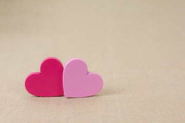 Two sweet pink hearts for valentine background
