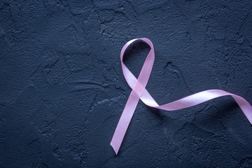 concept - cancer top view on dark background