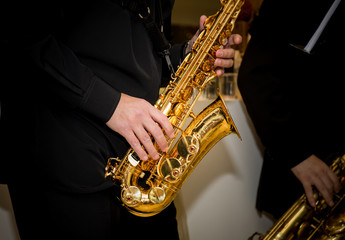 saxophone player palys his solo