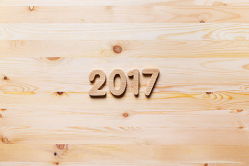 Year 2017 numeric on wooded background