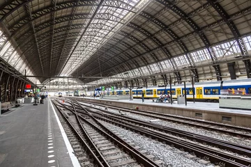 Fotobehang Central train station in Amsterdam © Sergii Figurnyi