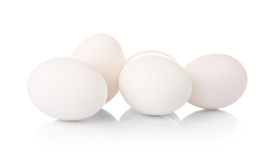 Raw eggs on white background