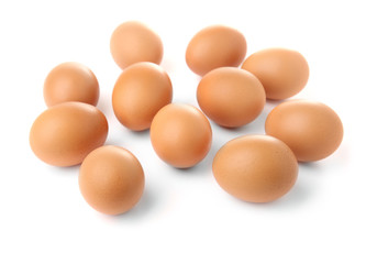 Raw eggs on white background