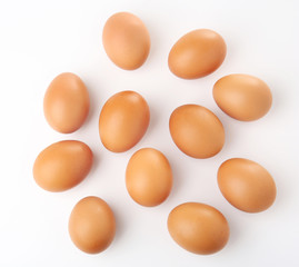 Raw eggs on white background