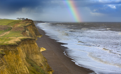 Rainbow off Weybourne Norfolk in rain storm