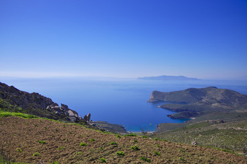 Fototapeta na wymiar Dry Mediterranean island coast scenery. Greek travel destinations poster..