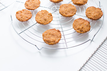 uncooked cookies on rack