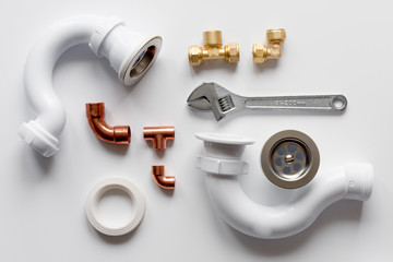 concept plumbing work top view on white background