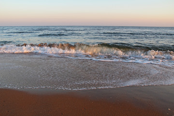 Beautiful view on the seashore at the sunrise. Crimea.