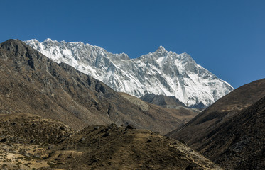 View of the mountain massif of mount Everest from the valley of the Chhukhung - Nepal, Himalayas