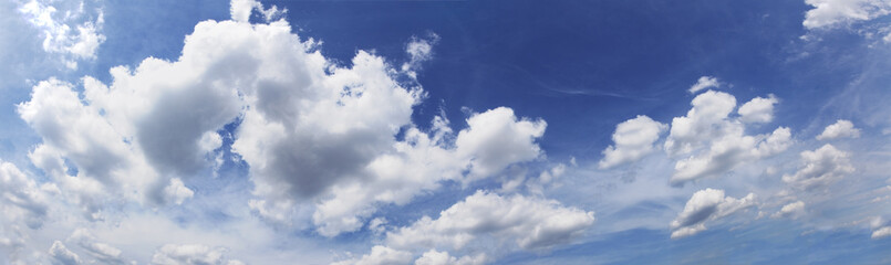 Blue sky cloudscape as background. Horizontal.