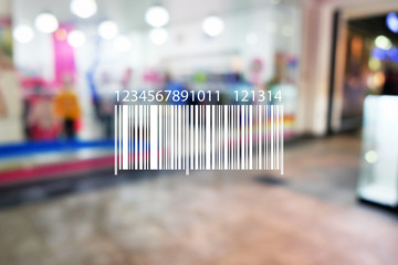 Barcode on blurred shopping mall background. Wholesale and retail concept.