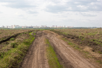 A dirt country road on a summer day