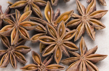 Food Background with Close-up of Star Anise on Vintage Black Tab