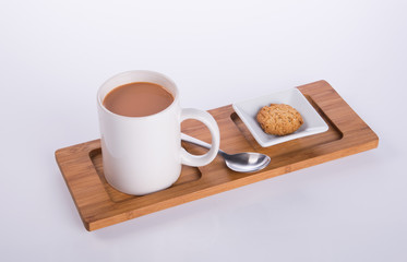 coffee or coffee with cookies on background.