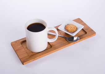 coffee or coffee with cookies on background.
