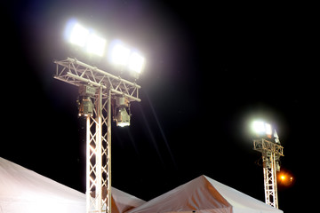 Metal halide lights on poles trust set up lighting in the event.