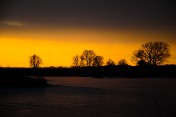 Beautiful winter sunset on river Dnieper