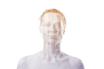 Portrait of a young woman with the effect of double exposure, nature style