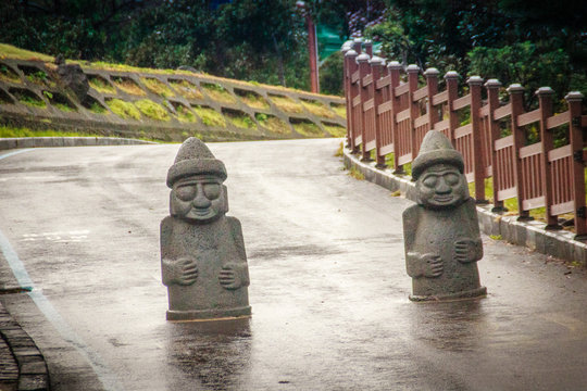 View of twin idols and stone sign nearby Yongduam that also know
