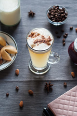 The morning latte on a gray tablecloth